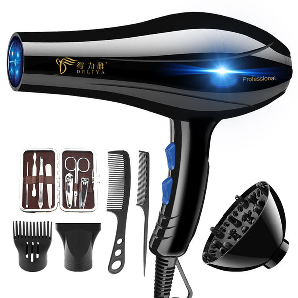 Black hair dryer with attachments on a white background