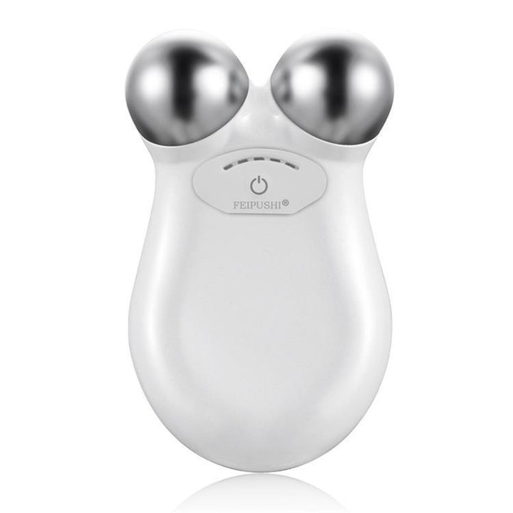 White facial massager with silver knobs on a white background