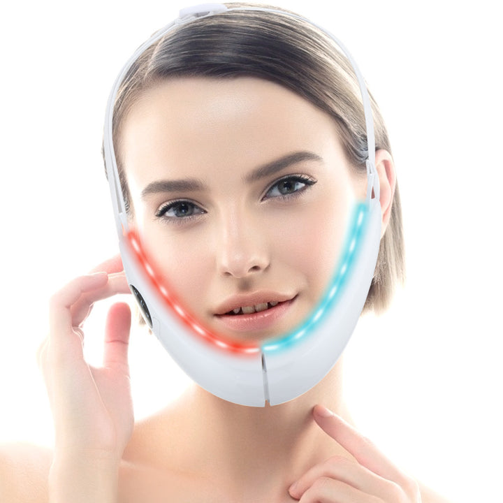 Woman wearing a facial device with red and blue lights on a white background