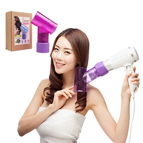 Woman using a purple handheld hair dryer with a white blow dryer, box in the background