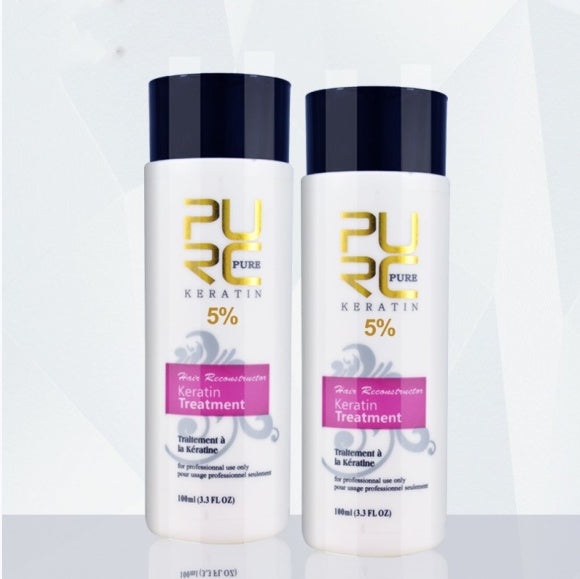 Puro Pure Keratin 5% hair reconstruction treatment bottles for deep repair and smoothing of damaged hair.