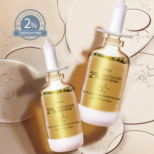 Two bottles of Seskey 2% Salicylic Acid Acne Serum with droppers on a beige background.