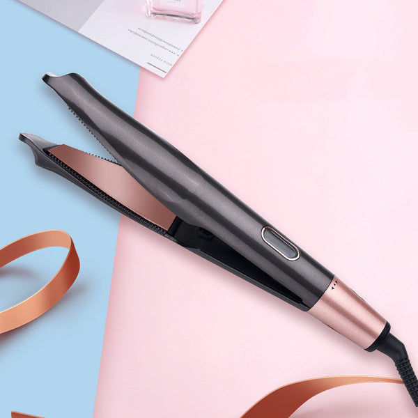 Hair straightener on a pink and blue gradient background