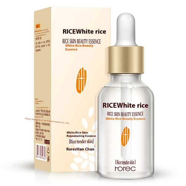RICEWhite rice skin beauty essence bottle and packaging on a white background