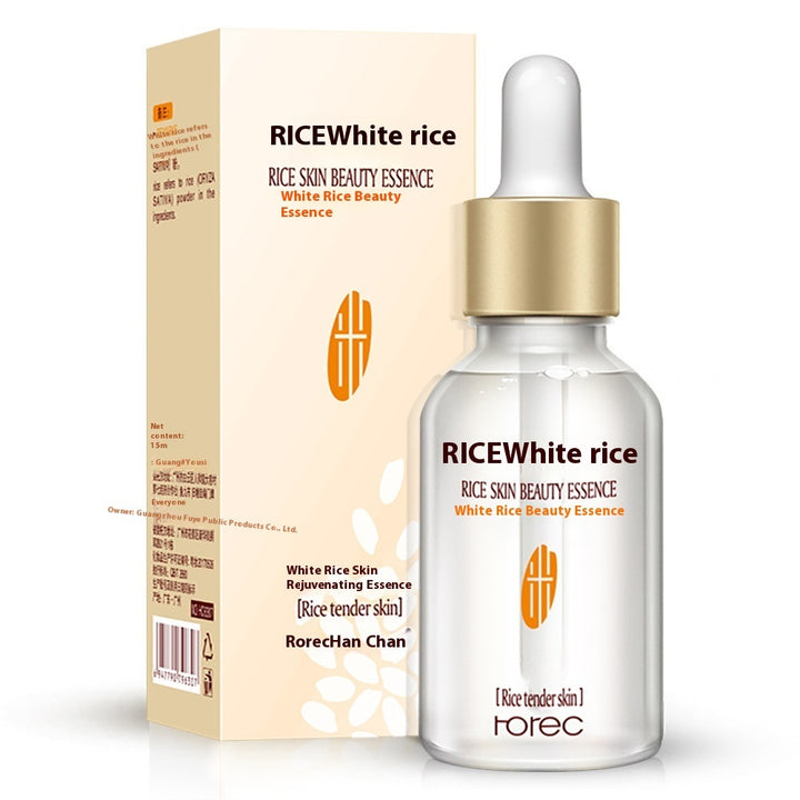 RICEWhite rice skin beauty essence bottle and packaging on a white background