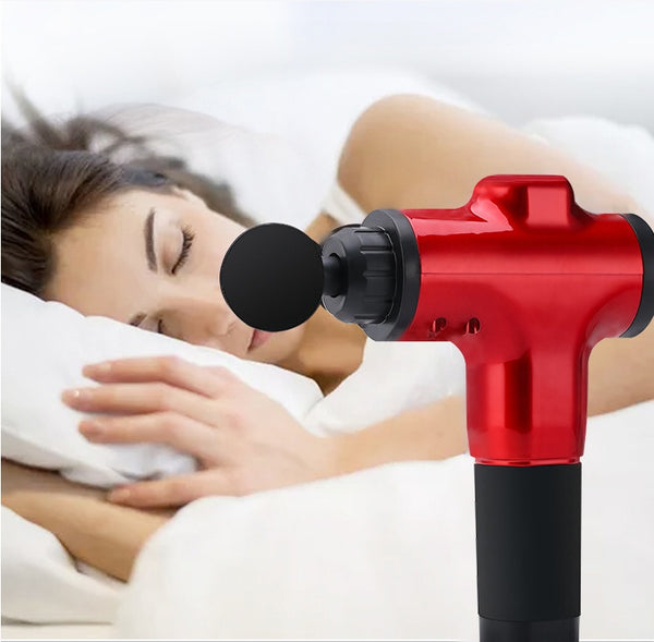 Woman lying down with a red massage gun held above her