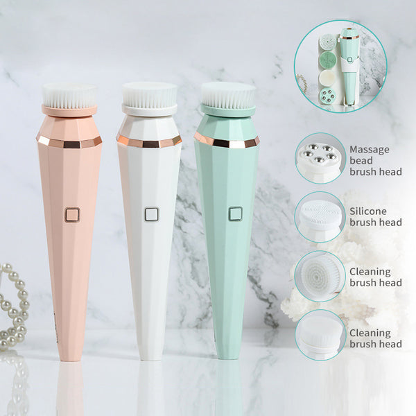 Three cleaning brushes with different brush heads on a marble background