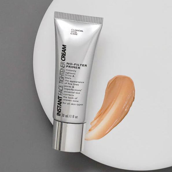 Tube of Instant Face Tightener Cream on a gray background