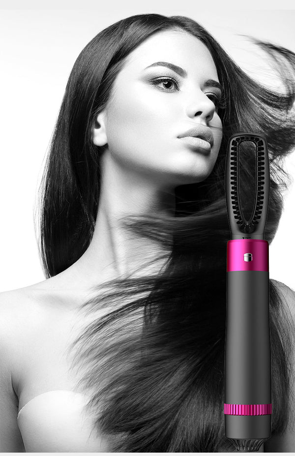 Woman with long hair using a hair styling tool on a white background