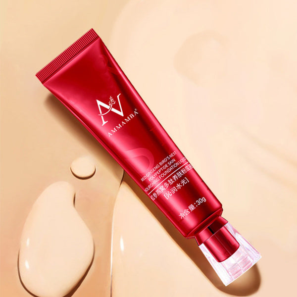 Red skincare tube with a brand logo on a beige background