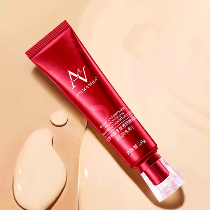 Red skincare tube with a brand logo on a beige background